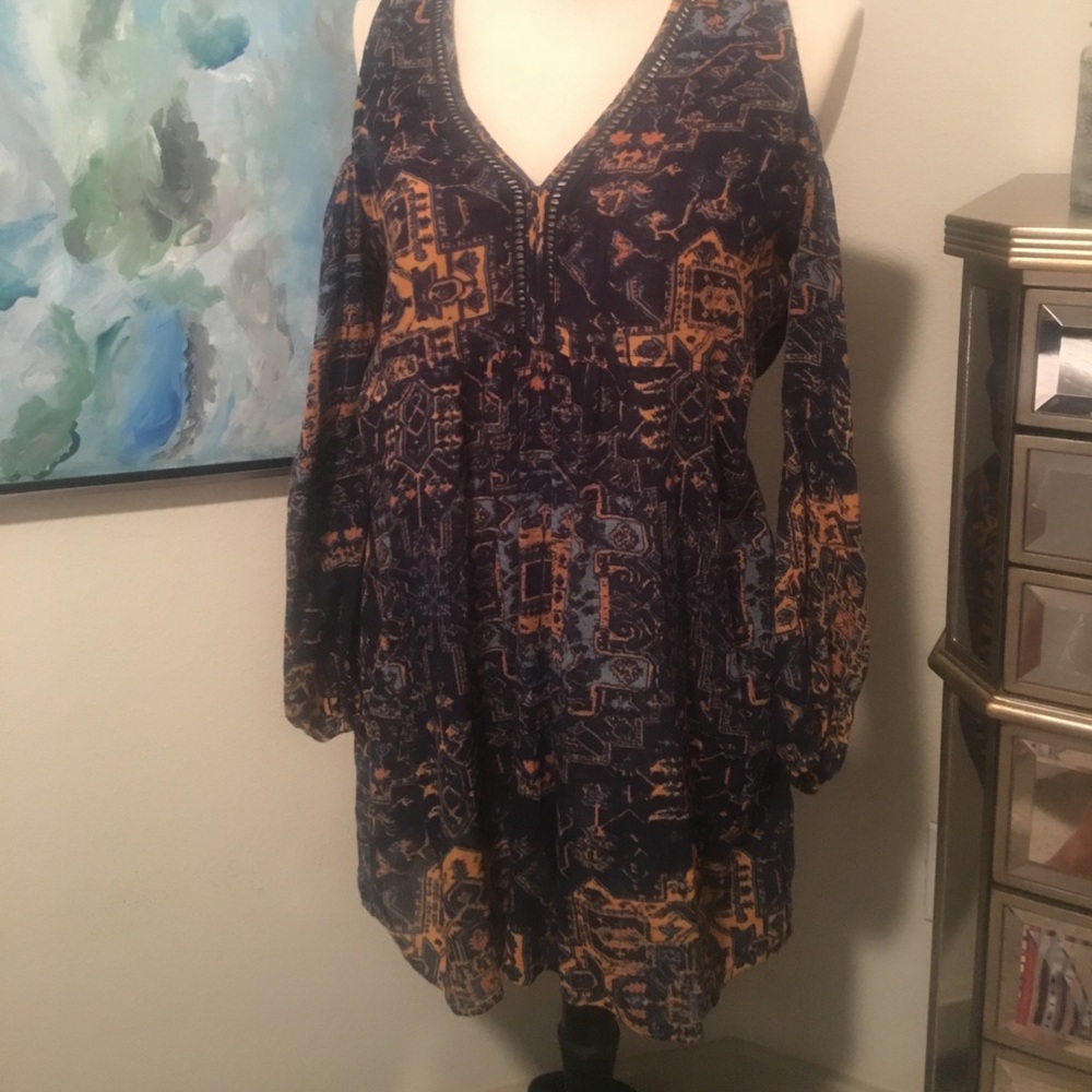 Fun summer dress with cold shoulders.
