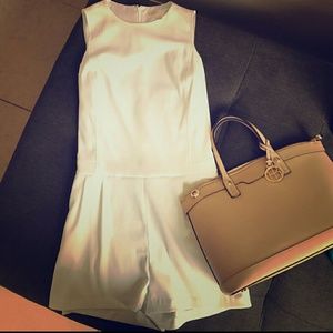Repost Michael Kors jumpsuit.