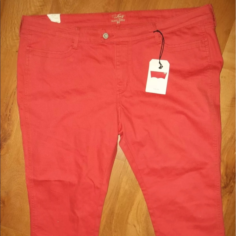 NWT Levi's orange cropped jeans. Plus size 22