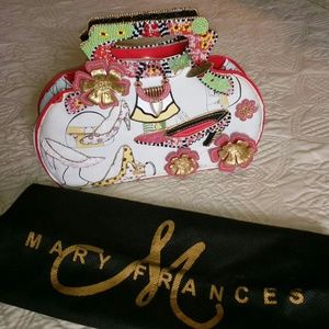 Collectible bag with beaded shoes motif