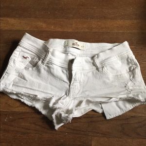 White Hollister stretch distressed low rise shorts