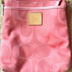 Pink cross body Coach purse