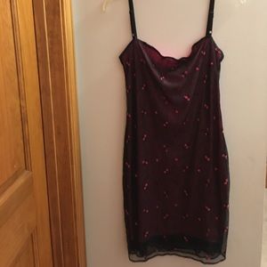 Black dress with pink embroidered flowers