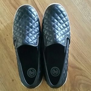 Quilted black slip ons