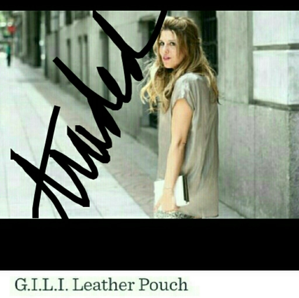NFS TRADED-NWOT G.I.L.I. GENUINE LEATHER CLUTCH