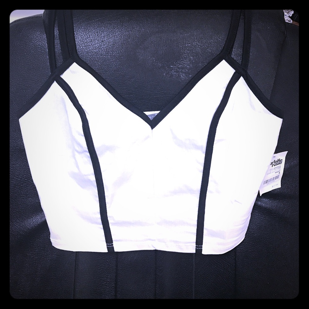 **DONATING TOMORROW.**  White Crop Top  ⚪️⚫️