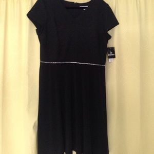 Black cocktail dress with sleeves