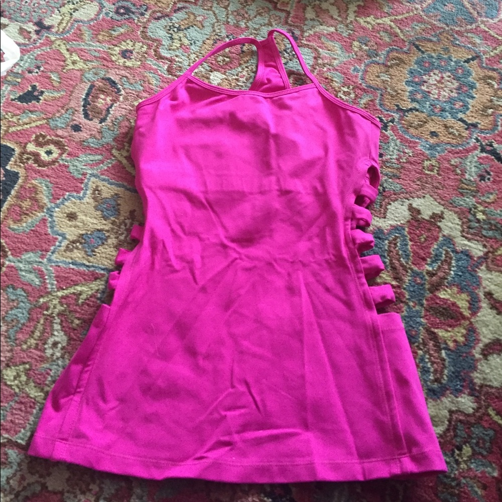 Kira Grace pink razor cut out tank.