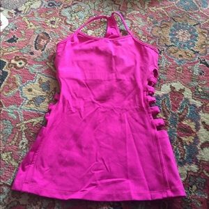 Kira Grace pink razor cut out tank.