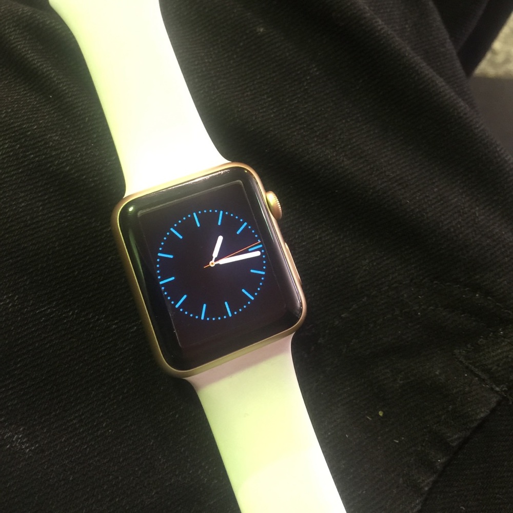 Gold Apple Watch 42mm.. With white band..
