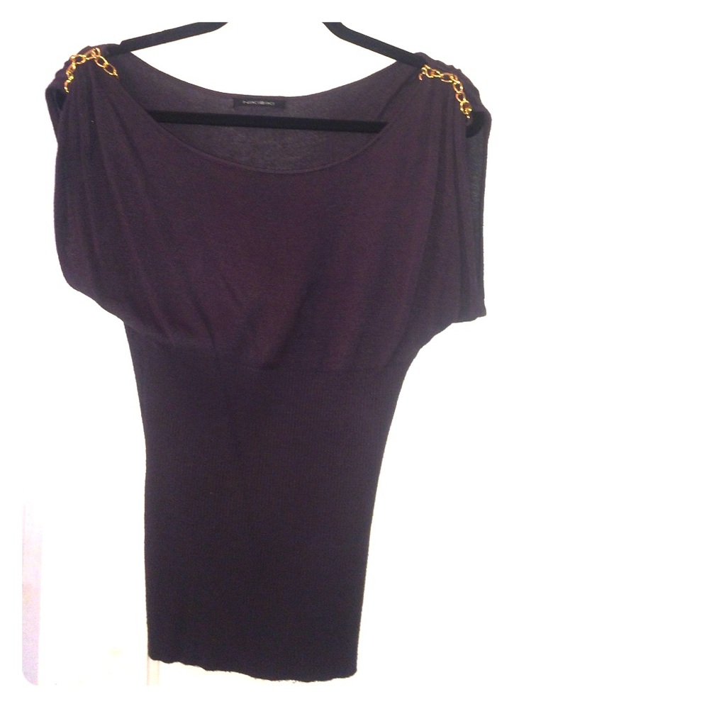 Navy-gray top with gold chain shoulder detail.