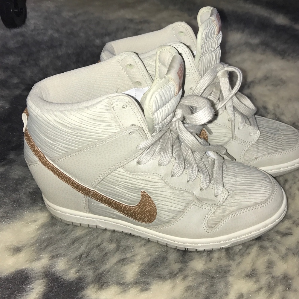 Woman's Nike wedged sneakers rose gold sz 7 1/2