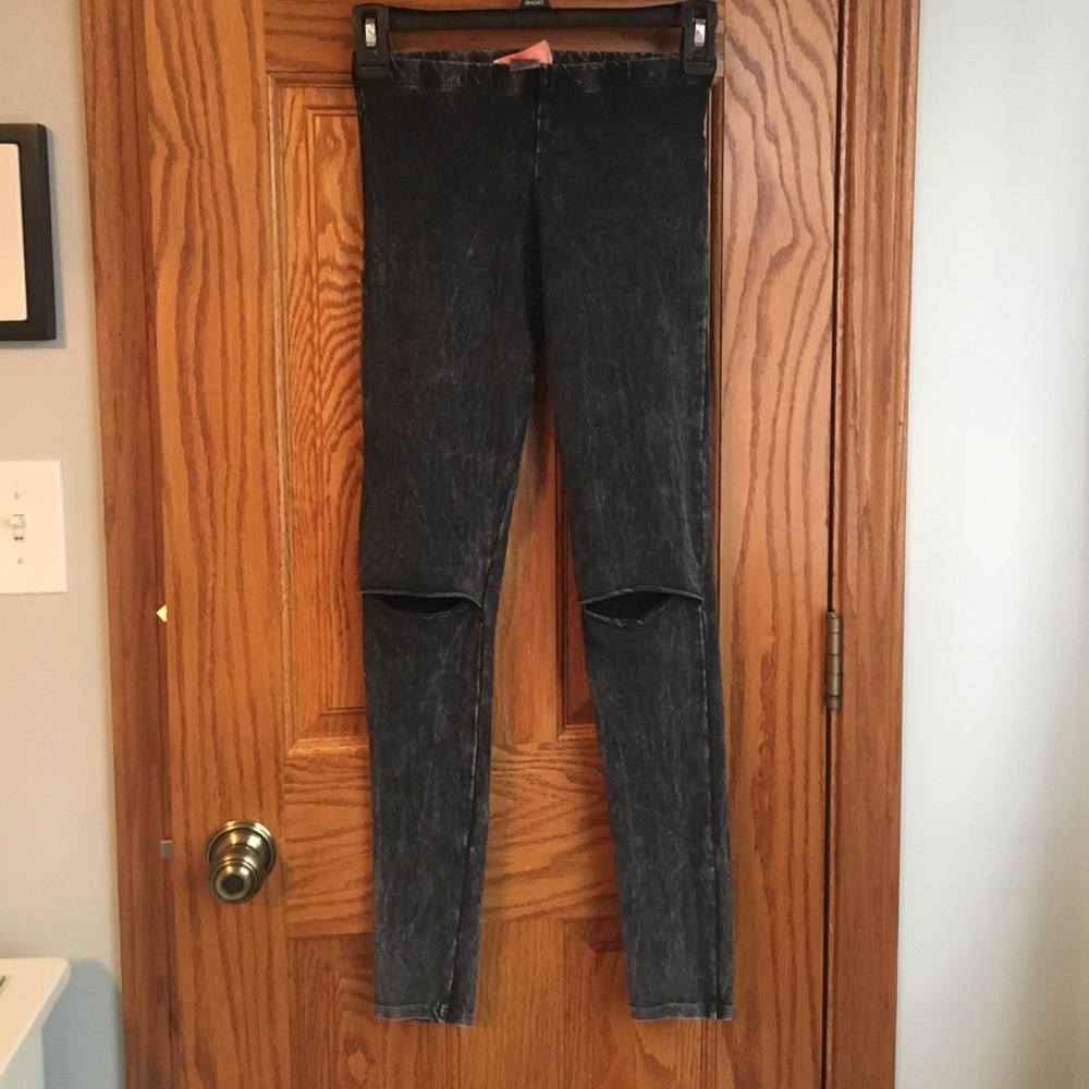Washed out leggings with rip in the knees. Size S