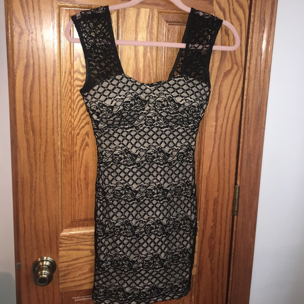 Black laced dress with cream lining underneath