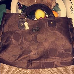 brown and gold coach handbag