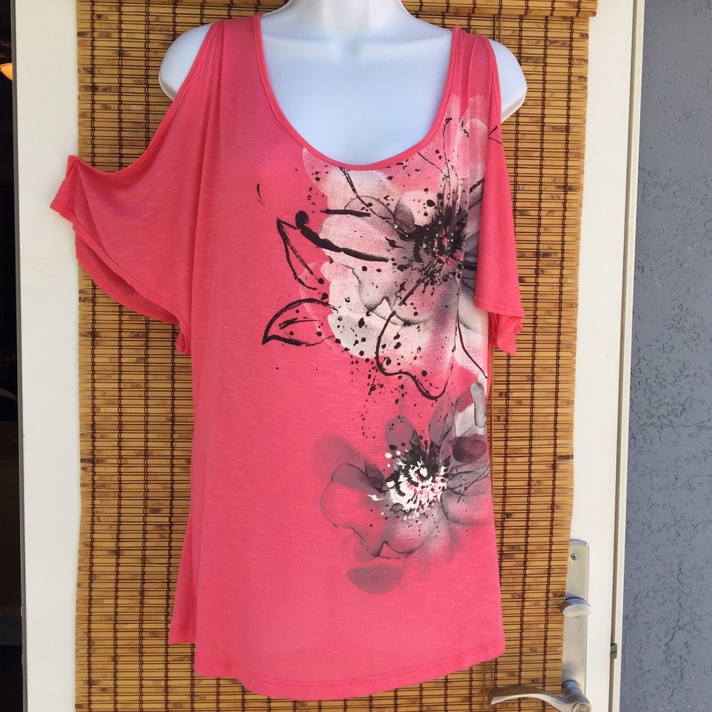 Floral top with rhinestones and keyhole shoulders.