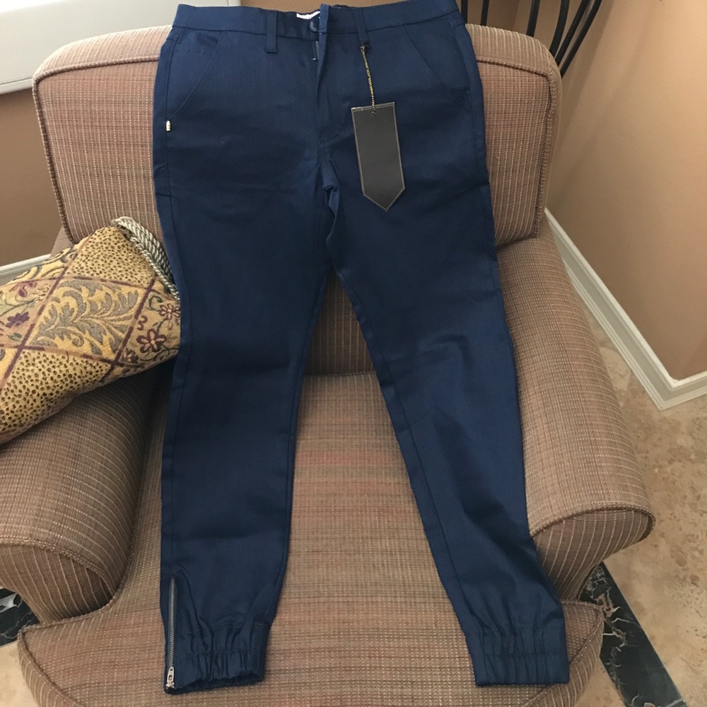 Blue jean jogger pants zippers on bottom sides