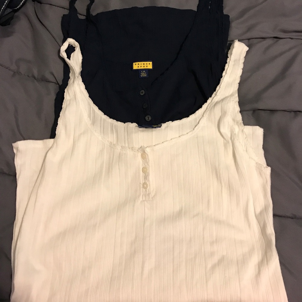 2 shirts New tried on once
