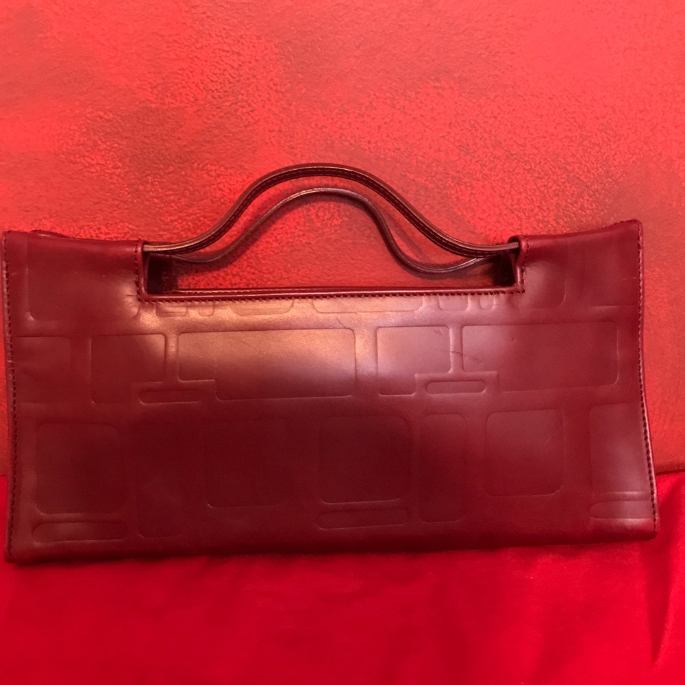 Kenneth Cole purse, absolutely no signs of wear.