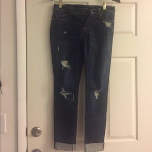 Distressed designer jeans