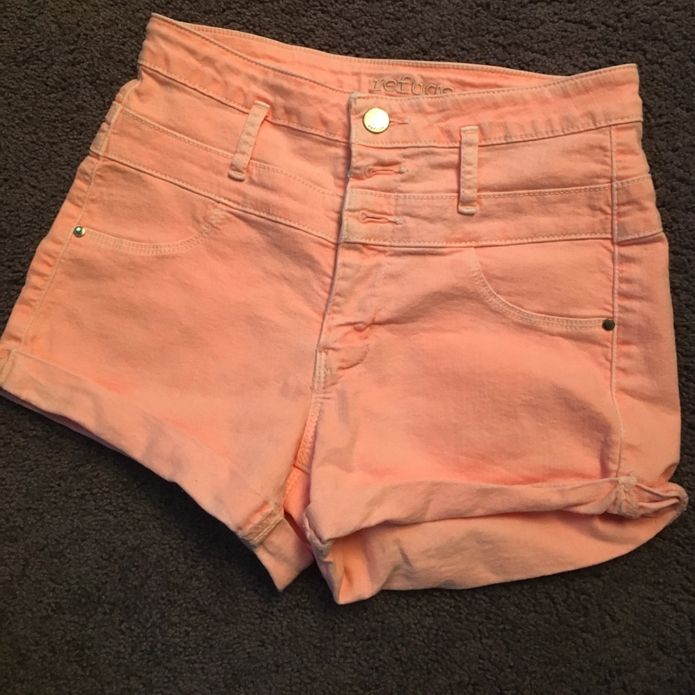 High waisted light neon orange shorts