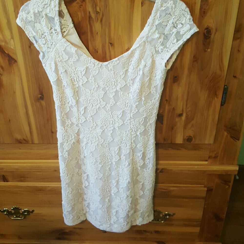 Pale pink mini dress.