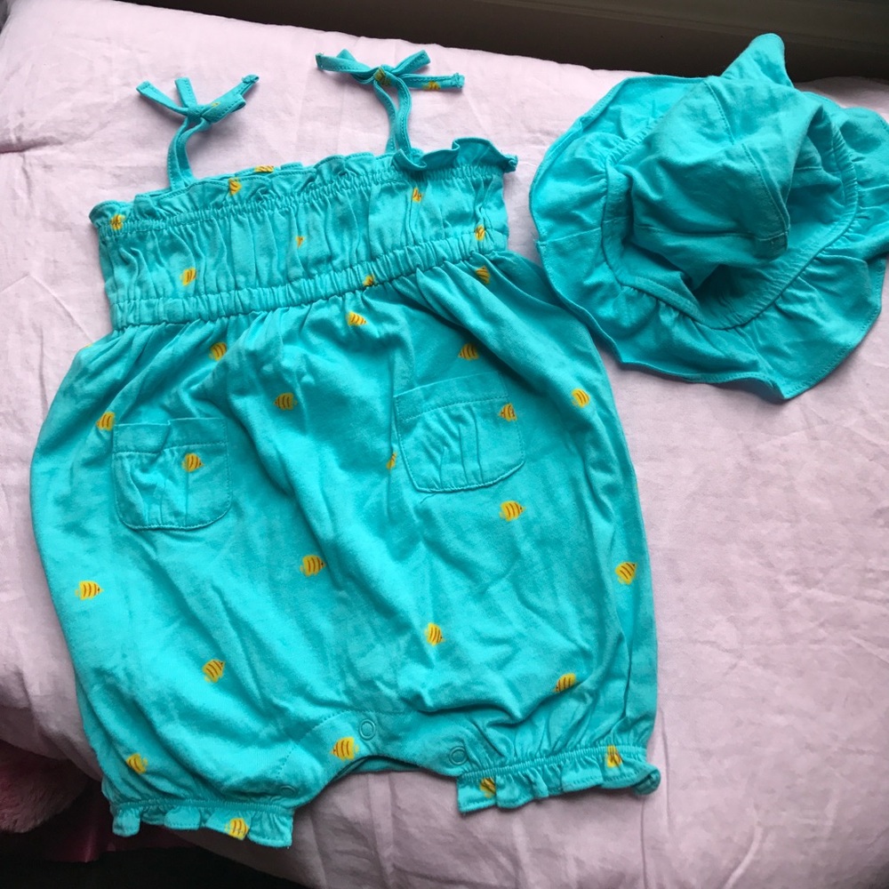 Romper with a sun hat.