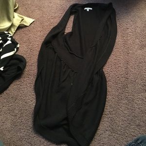 Sleeveless black sweater