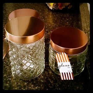 3 Beautiful glass jars w/Copper colored lids.
