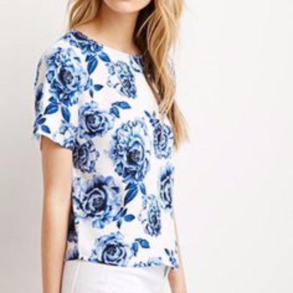 White and blue floral blouse