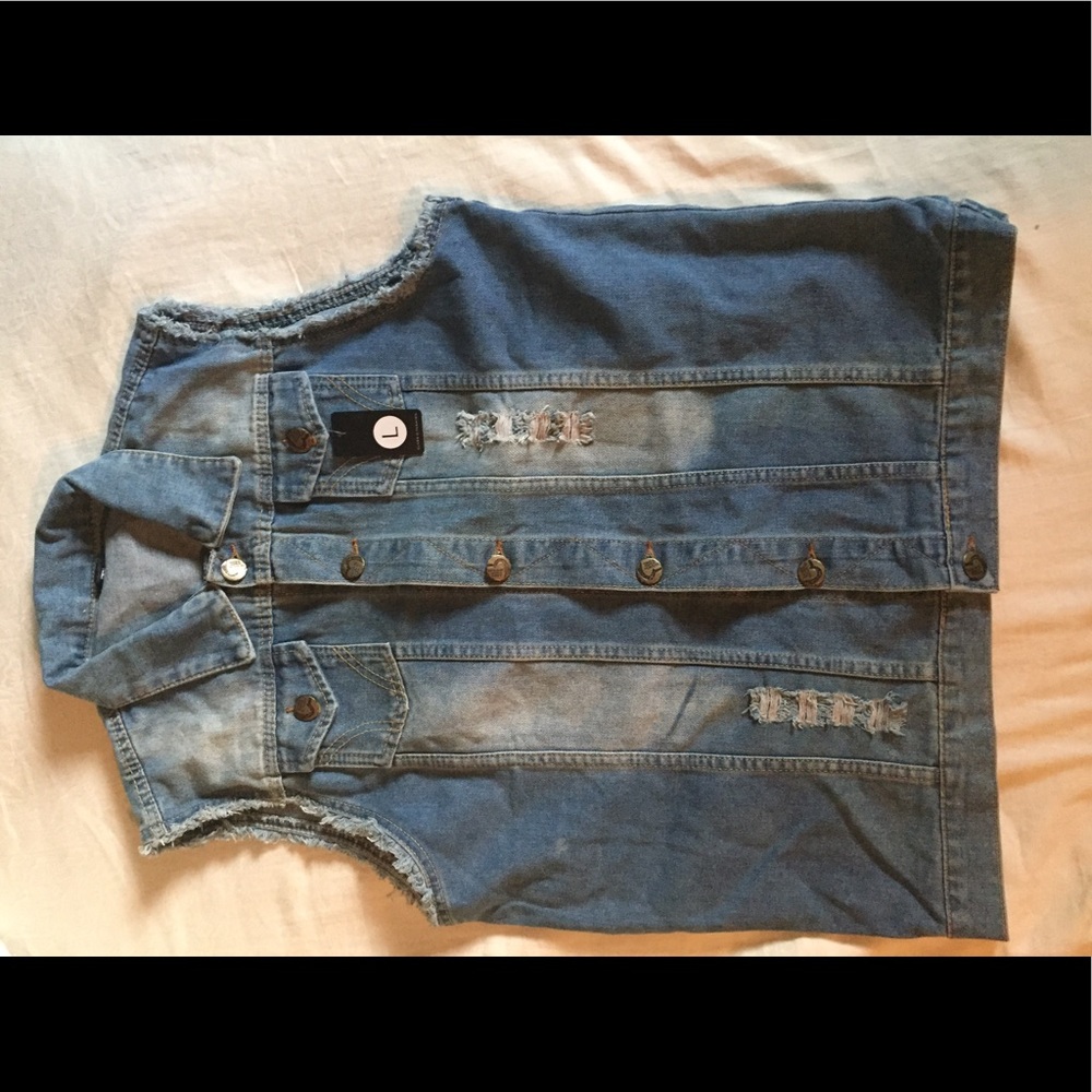 Distressed blue jean vest