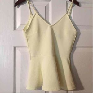 Pale yellow peplum tank top