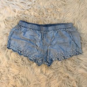 soft jean with scallop design on the bottom