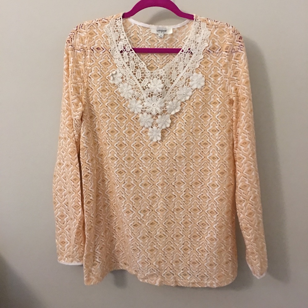 Orange and white long sleeve top