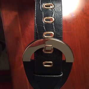 black belt with gold buckle