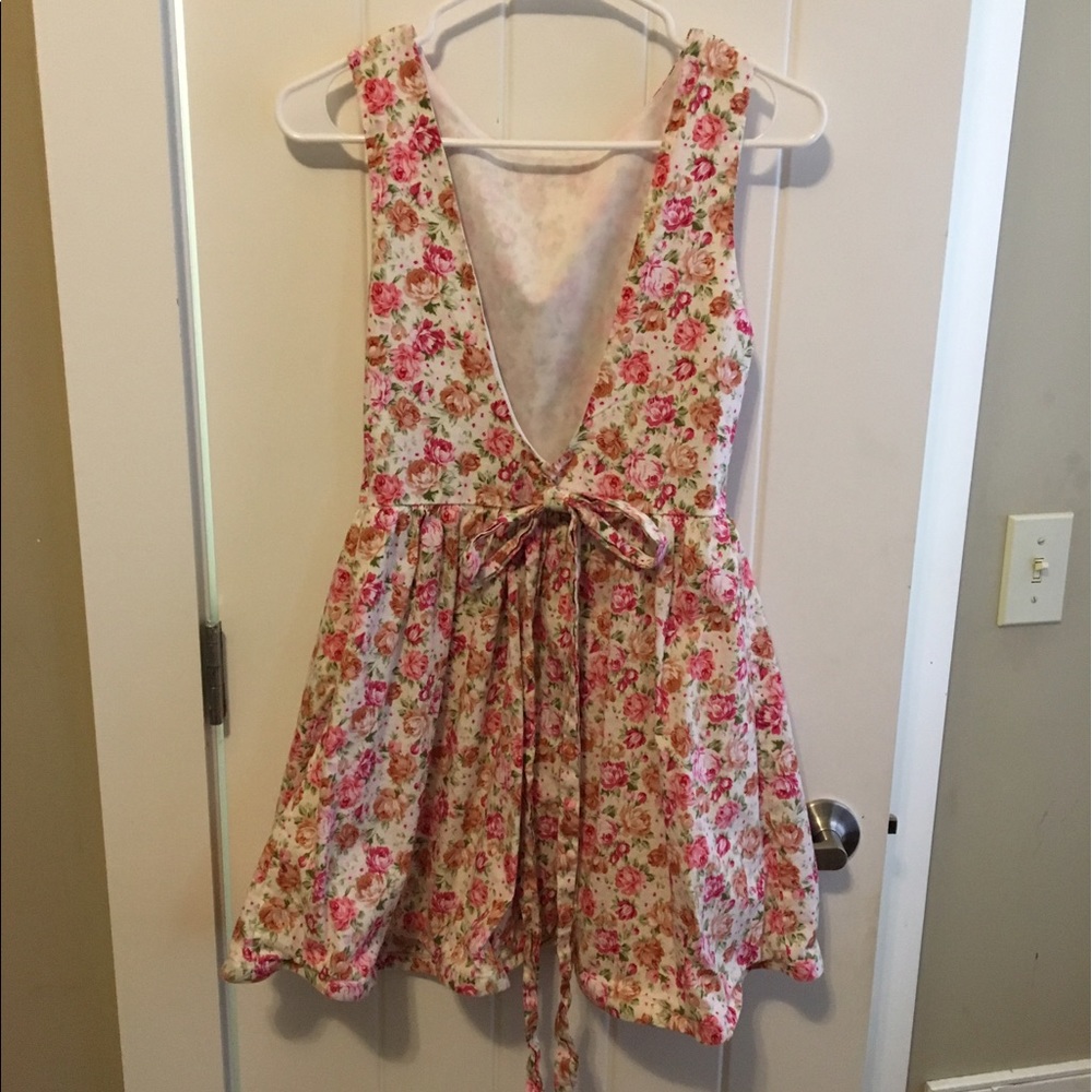 rose floral dress with a low back and bow back