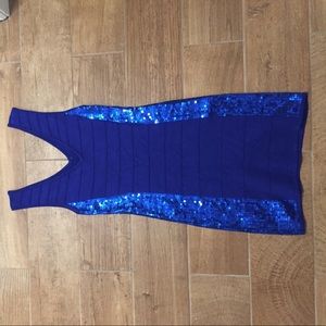 Blue fitted dress with sequins on the side
