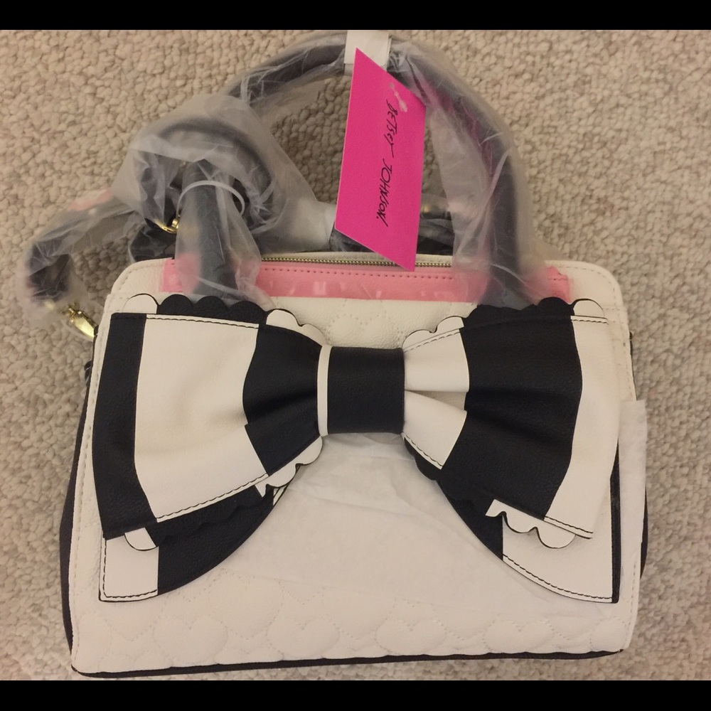 Betsey Johnson sachet with floral crossbody strap