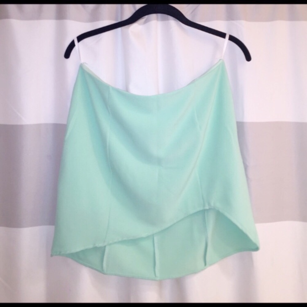 Mint Akira mini skirt with asymmetrical bottom