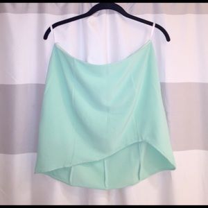 Mint Akira mini skirt with asymmetrical bottom