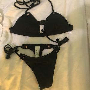 Black thong bikini. Size 4-6. Brand new.