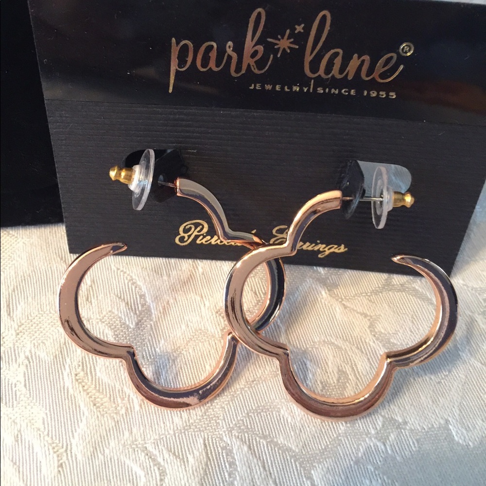 NWOT Joyride Rose Gold pierced earrings.