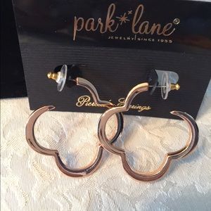 NWOT Joyride Rose Gold pierced earrings.