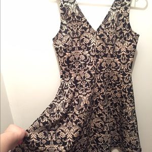 Black and beige detailed dress