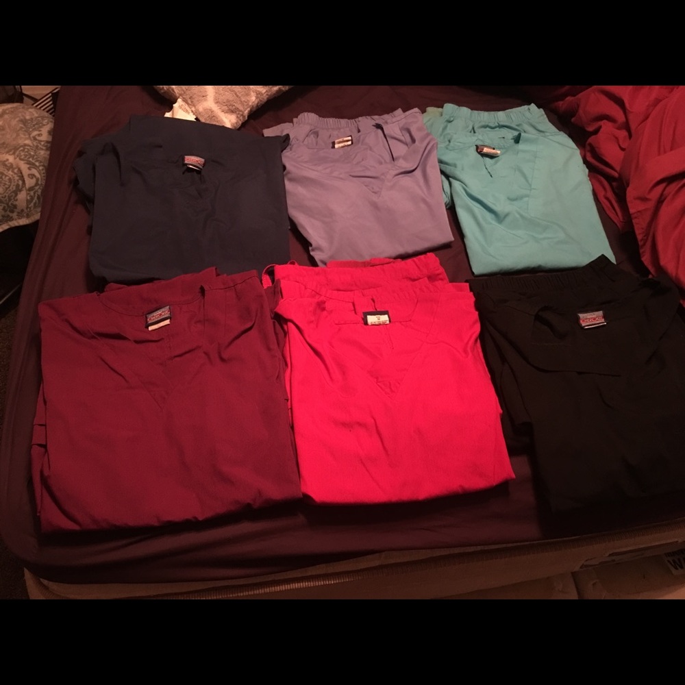 Six pair solid Cherokee Scrubs
