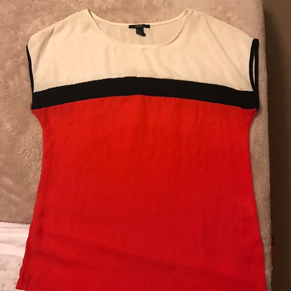 Red top with black and white color breaks