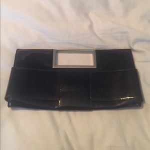 Black, patent leather clutch