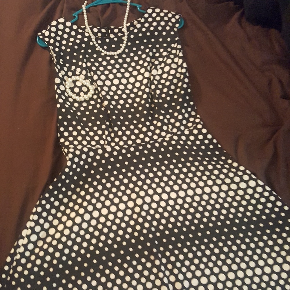 Polka dot black in White dress