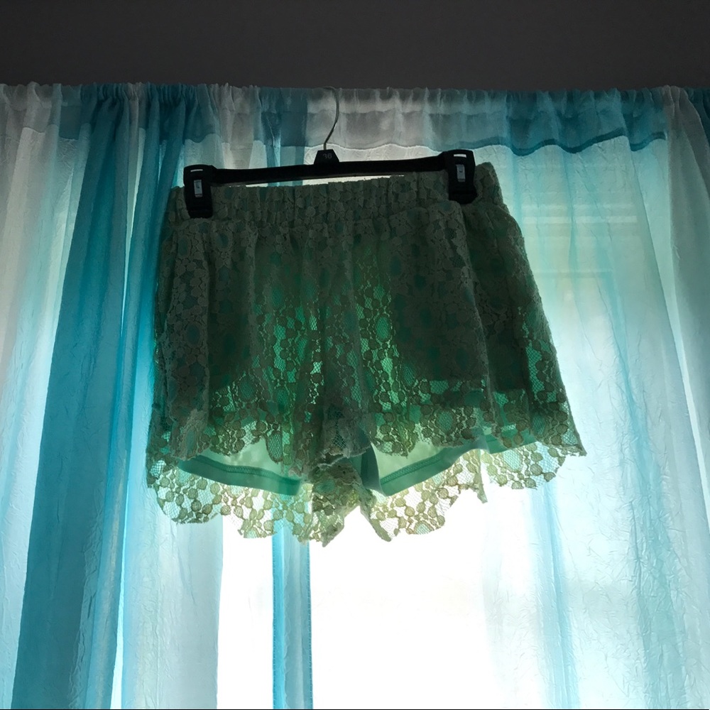 Pastel green lace shorts