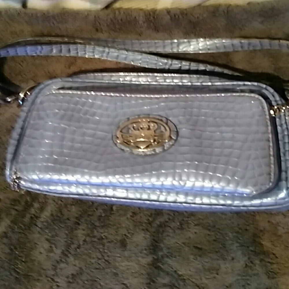 Kathy Van Zeeland  blue purse